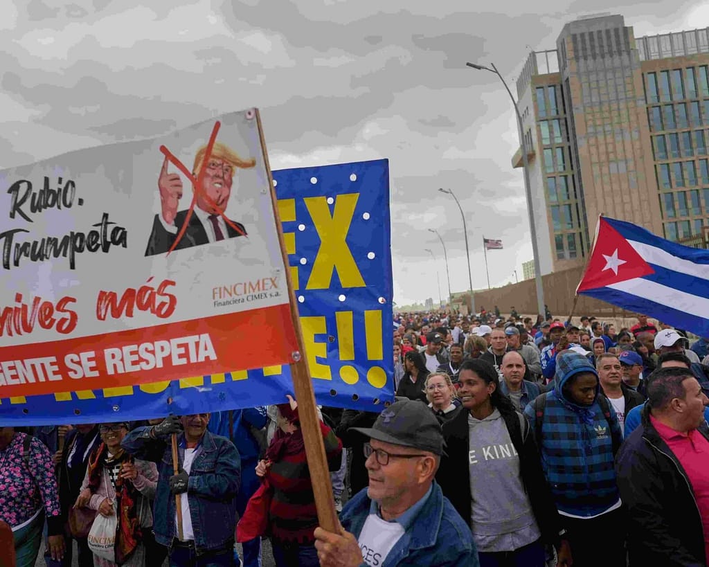 People in Havana on an ‘anti imperialist protest outside the US embassy in mid January after the repatriation of Cuban officers killed during the US attack on Venezuela avif compressed
