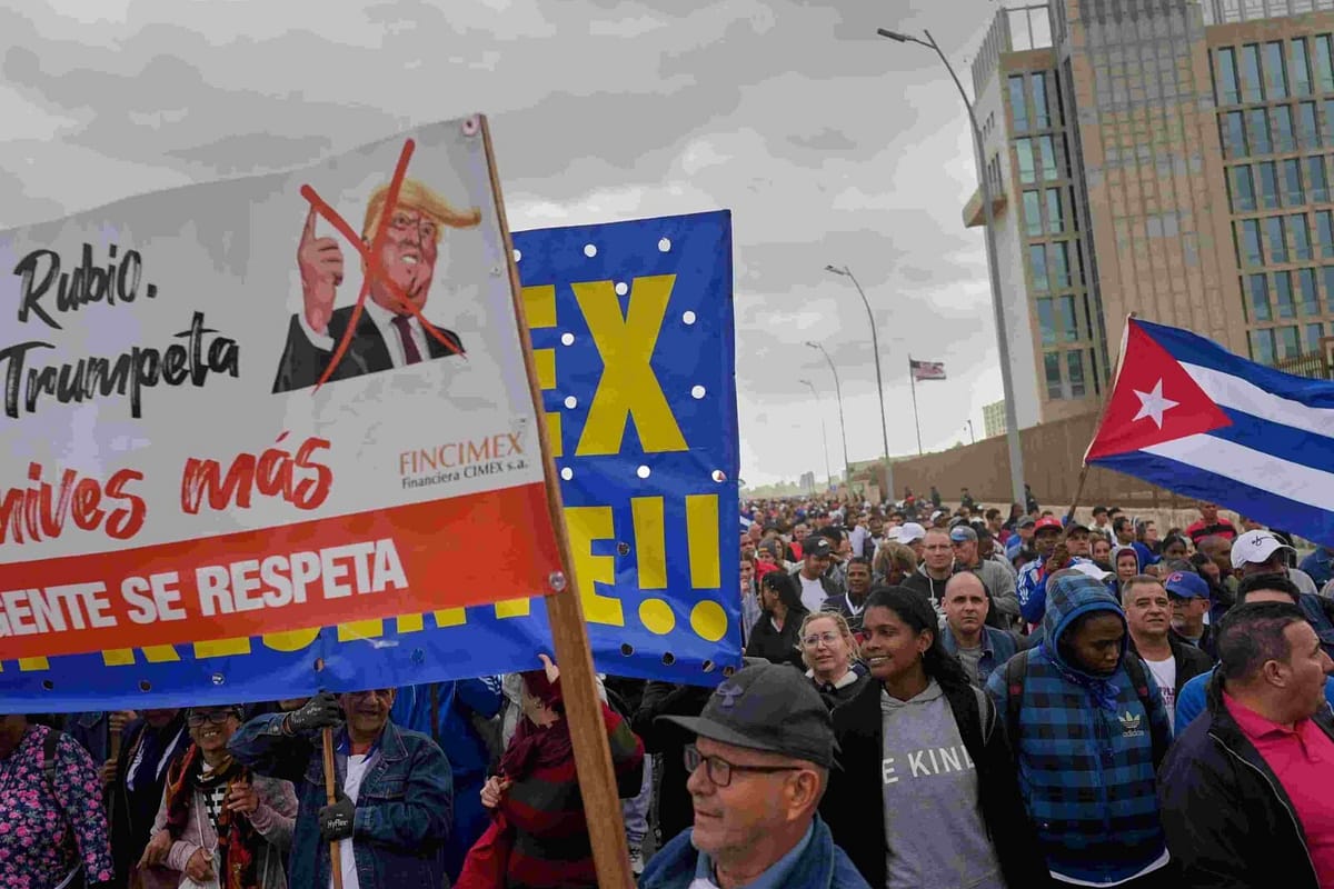 People in Havana on an ‘anti imperialist protest outside the US embassy in mid January after the repatriation of Cuban officers killed during the US attack on Venezuela avif compressed